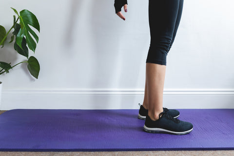 files/persons-legs-stand-on-purple-yoga-mat.jpg